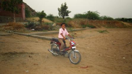 Youth riding motoclycle