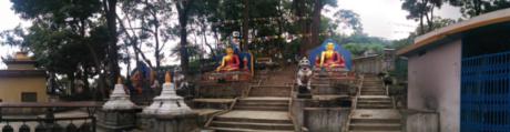 Three Buddhas at the East Entrance.