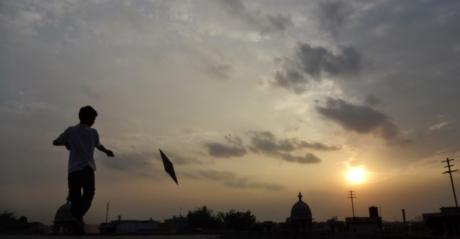 Evening city kite flying