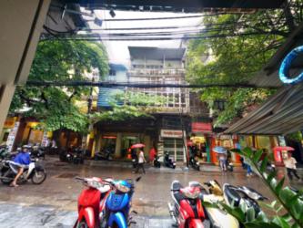 outside the front of hotel, one rainy morning.